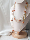 collana geometrica lunga, con catena in acciaio, ovali in ottone e pietre dure naturali